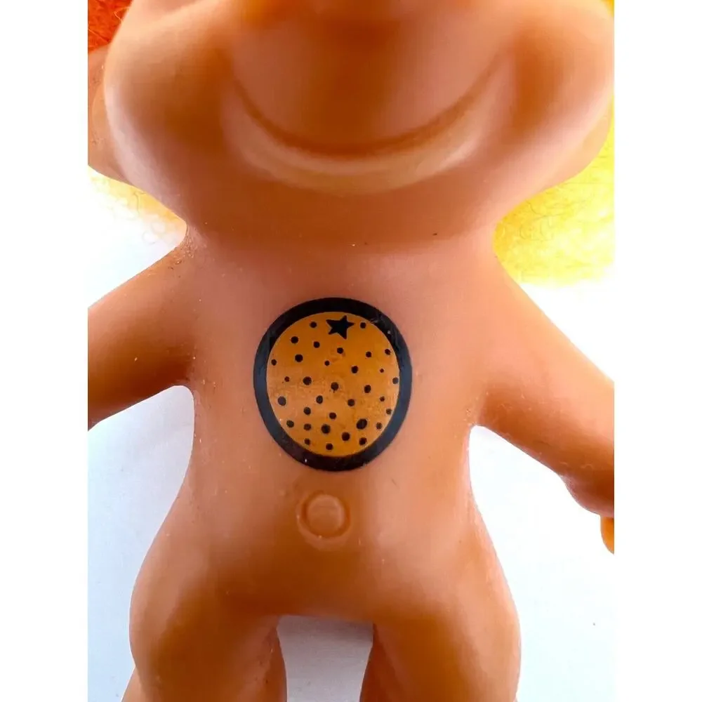 Vintage Lucky Troll Doll Yellow Hair Gold Eyes Orange Print on Belly